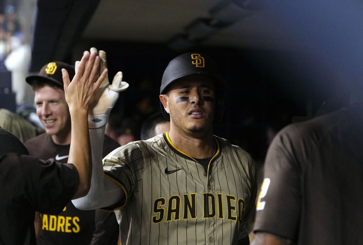 Jun 8, 2025; Milwaukee, Wisconsin, USA; San Diego Padres third base Manny Machado (13) celebrates after hitting a home run against the Milwaukee Brewers in the seventh inning at American Family Field. Mandatory Credit: Michael McLoone-Imagn Images