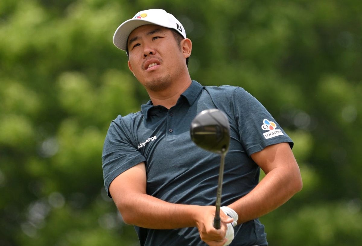 Jun 8, 2025; Caledon, Ontario, CAN;  Byeong Hun An watches his tee shot at the fifth hole during the final round of the RBC Canadian Open golf tournament. Mandatory Credit: Dan Hamilton-Imagn Images