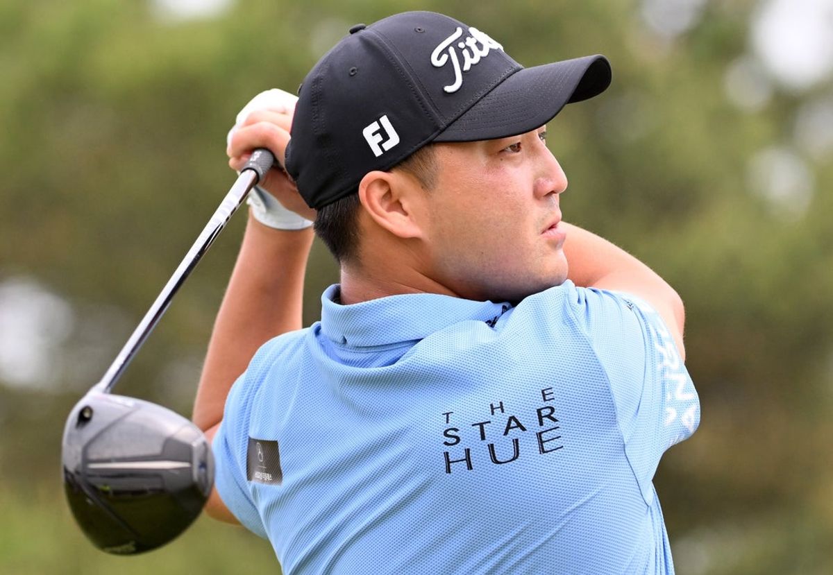 Jun 8, 2025; Caledon, Ontario, CAN;  Richard Lee hits his tee shot at the fifth hole during the final round of the RBC Canadian Open golf tournament. Mandatory Credit: Dan Hamilton-Imagn Images