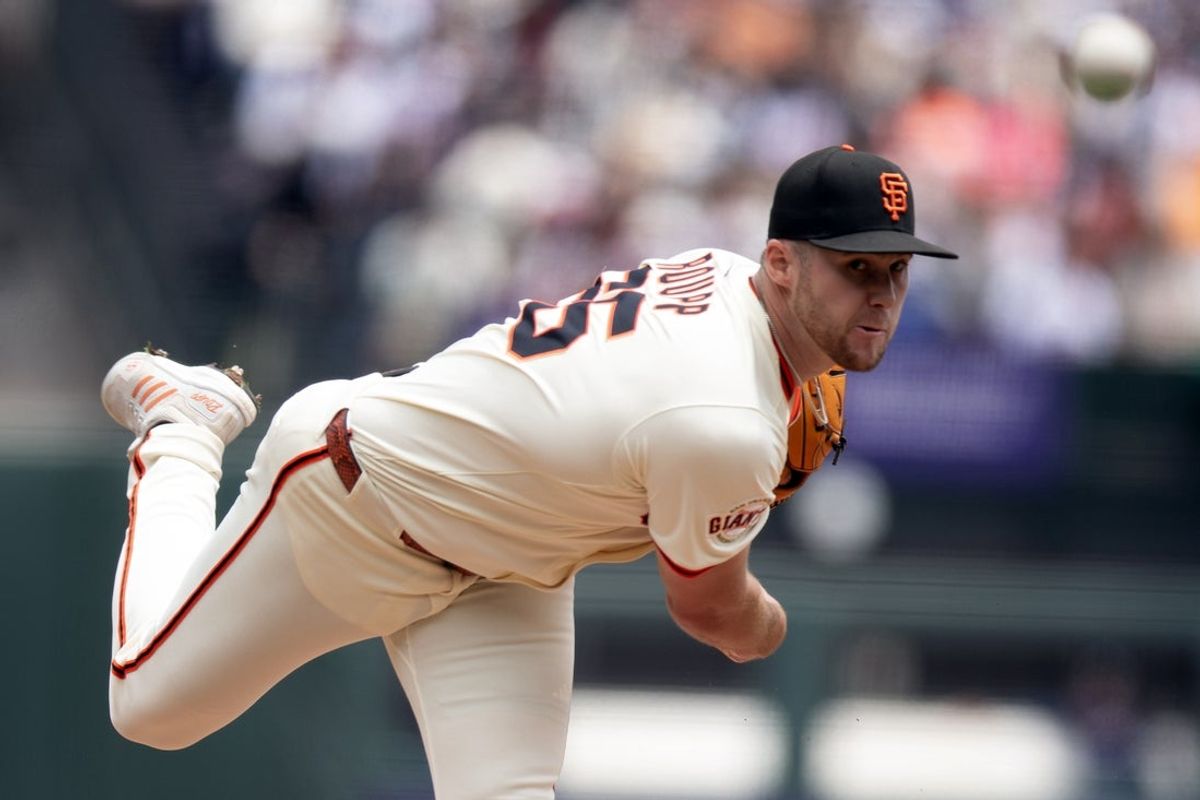 Jun 8, 2025; San Francisco, California, USA; San Francisco Giants starting pitcher Landen Roupp (65) delivers a pitch against the Atlanta Braves during the first inning at Oracle Park. Mandatory Credit: D. Ross Cameron-Imagn Images