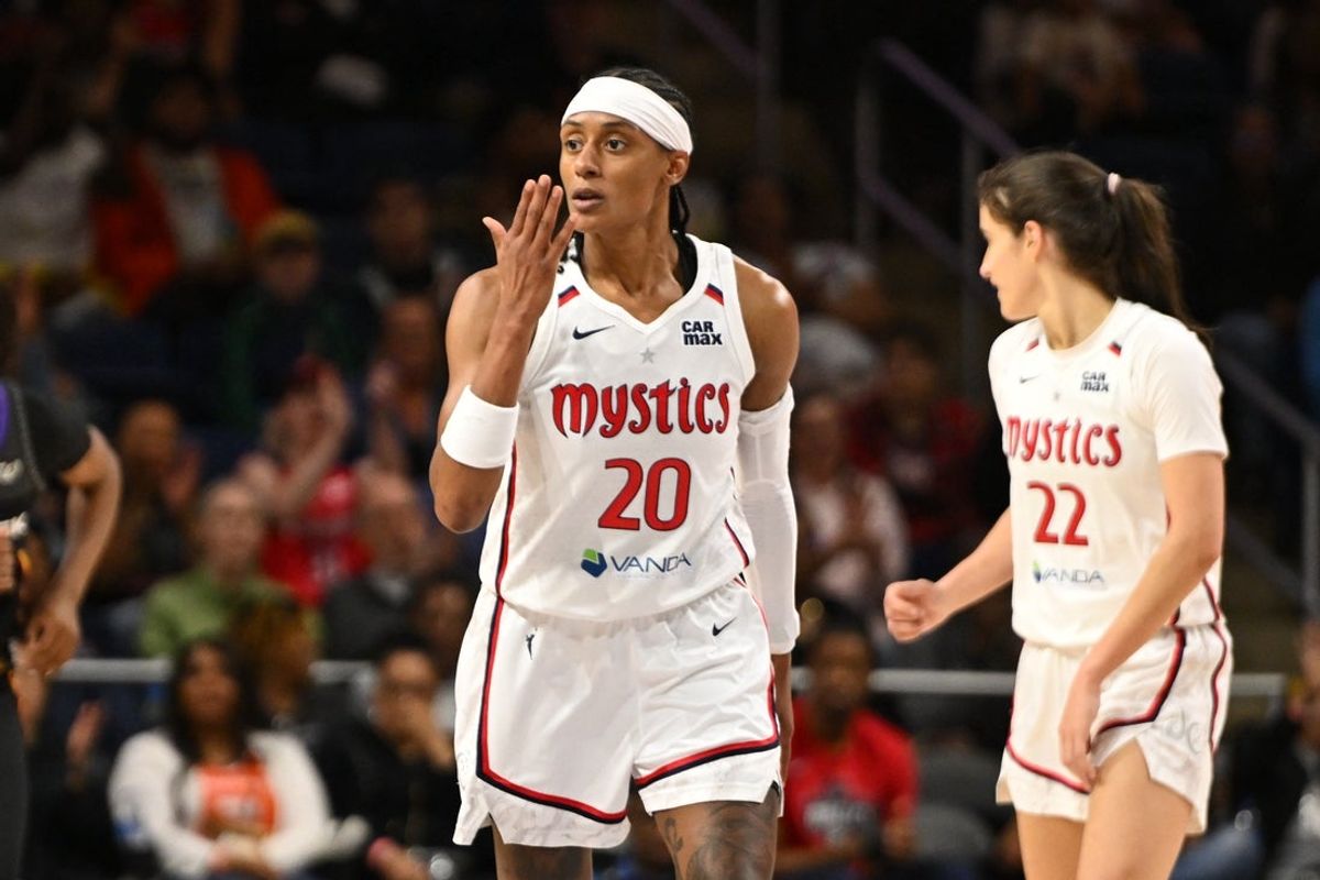 Jun 8, 2025; Washington, District of Columbia, USA; Washington Mystics guard Brittney Sykes (20) reacts after a three point basket during the third quarter against the Connecticut Sun at CareFirst Arena. Mandatory Credit: Rafael Suanes-Imagn Images