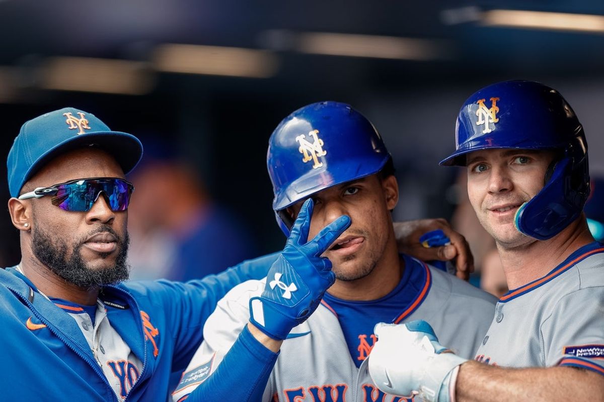 Jun 8, 2025; Denver, Colorado, USA; New York Mets outfielder Starling Marte (6) and right fielder Juan Soto (22) and first baseman Pete Alonso (20) celebrate in the dugout in the eighth inning against the Colorado Rockies at Coors Field. Mandatory Credit: Isaiah J. Downing-Imagn Images