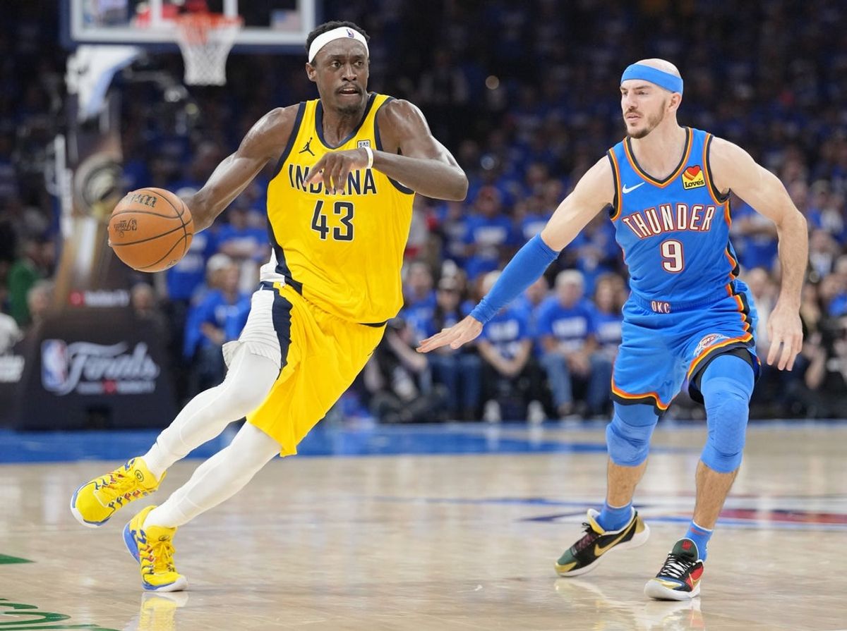 Jun 8, 2025; Oklahoma City, Oklahoma, USA; Indiana Pacers forward Pascal Siakam (43) dribbles the ball against Oklahoma City Thunder guard Alex Caruso (9) during the first half during game two of the 2025 NBA Finals at Paycom Center. Mandatory Credit: Kyle Terada-Imagn Images