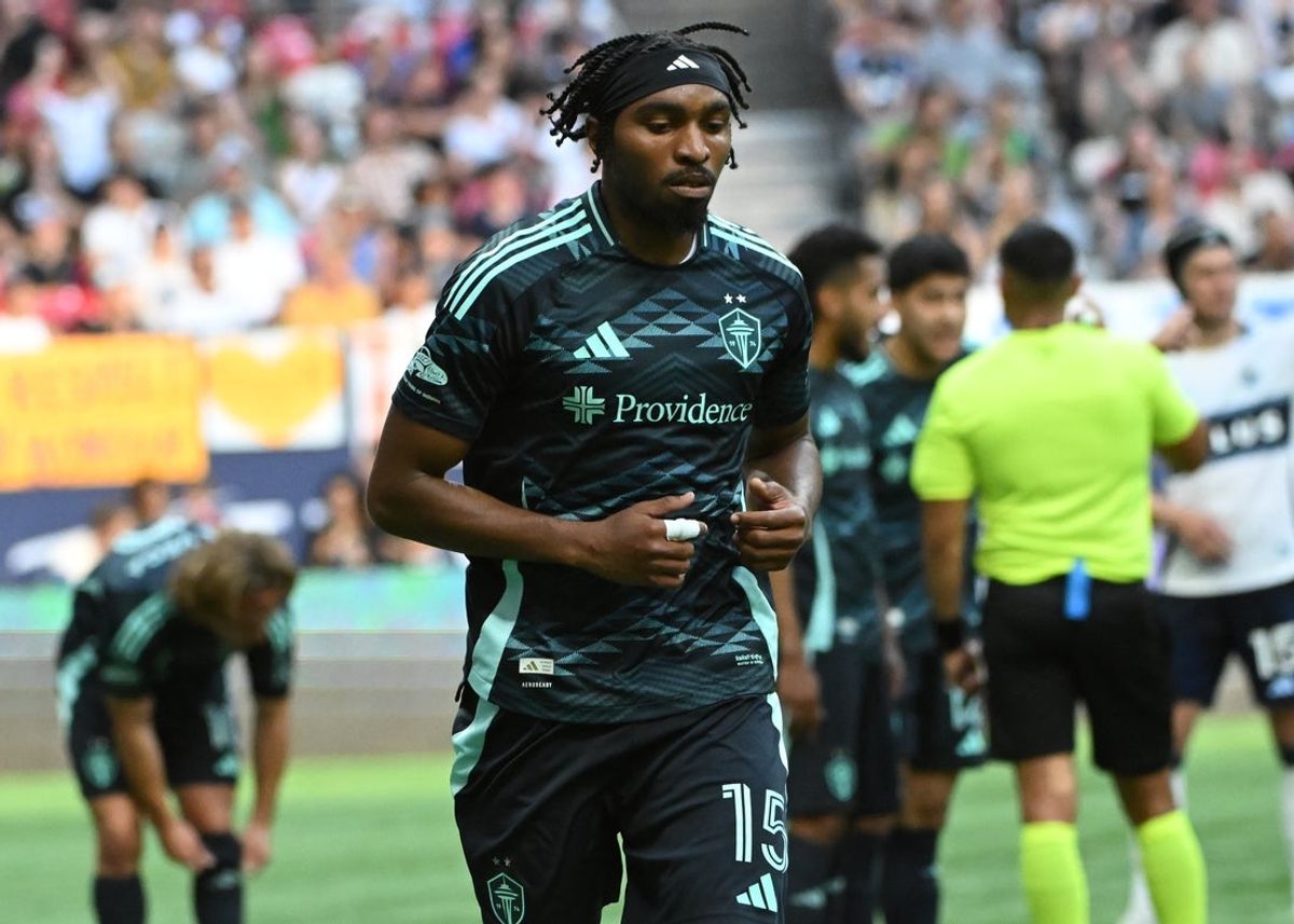 Jun 8, 2025; Vancouver, British Columbia, CAN; Seattle Sounders defender Jon Bell (15) runs off the field for a red card offense during the second half at BC Place against the Vancouver Whitecaps FC. Mandatory Credit: Simon Fearn-Imagn Images