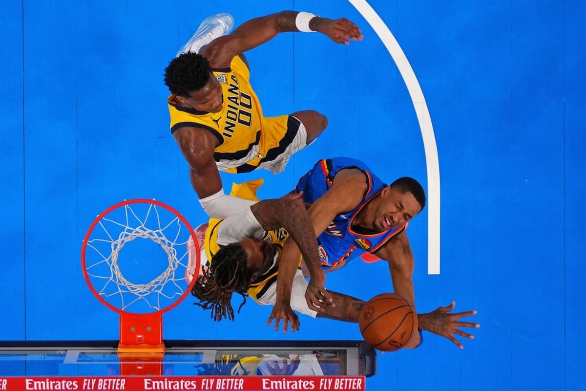 Jun 8, 2025; Oklahoma City, Oklahoma, USA; Oklahoma City Thunder guard Aaron Wiggins (21) shoots the ball against Indiana Pacers forward James Johnson (16) during the second half during game two of the 2025 NBA Finals at Paycom Center. Mandatory Credit: Kyle Terada-Imagn Images