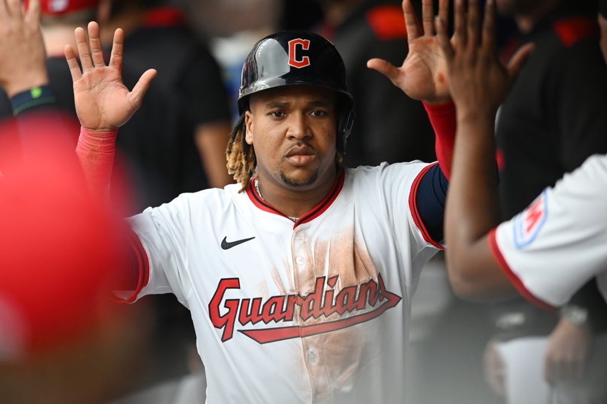 Jun 9, 2025; Cleveland, Ohio, USA; Cleveland Guardians third baseman Jose Ramirez (11) celebrates after scoring during the third inning against the Cincinnati Reds at Progressive Field. Mandatory Credit: Ken Blaze-Imagn Images