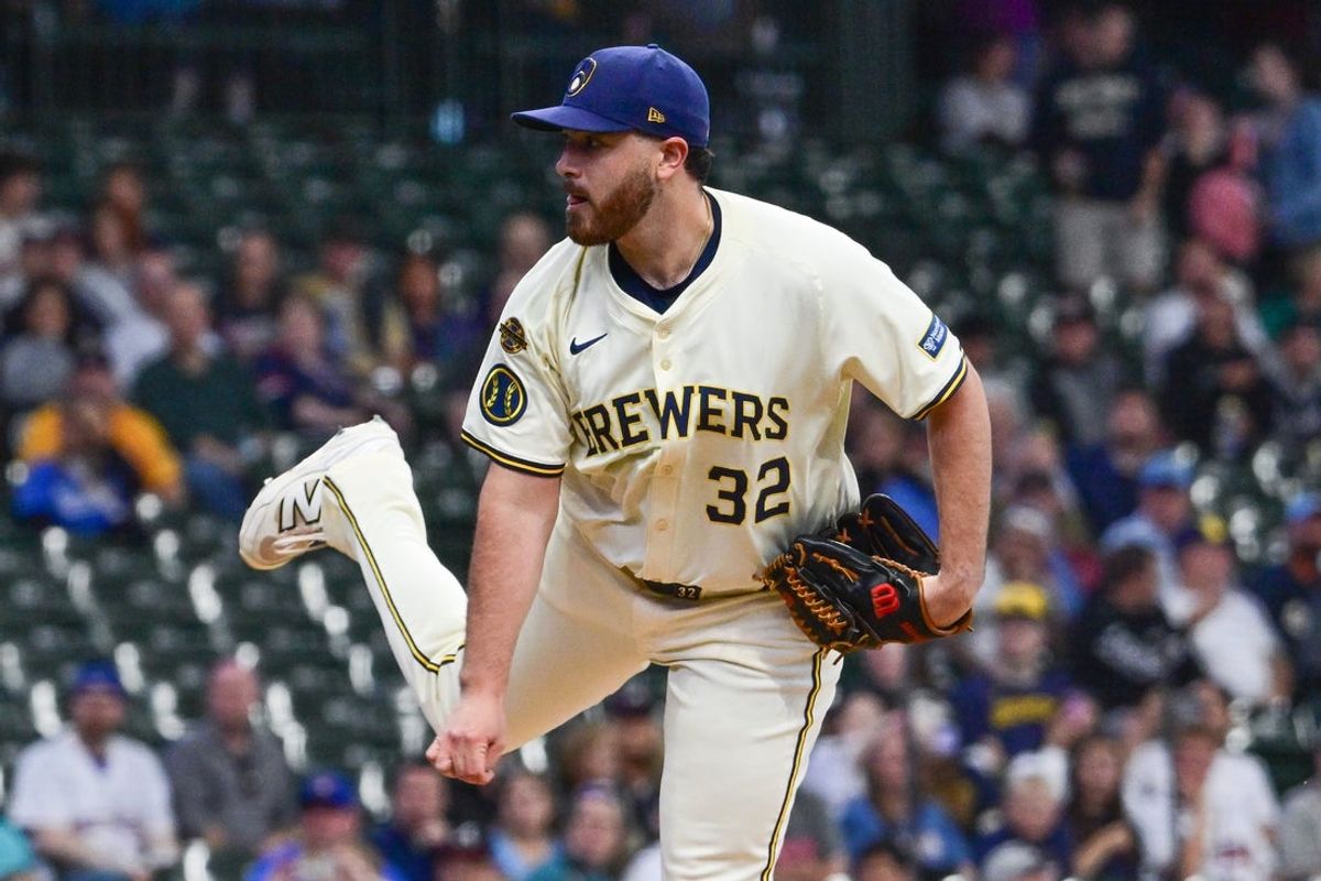 Jun 9, 2025; Milwaukee, Wisconsin, USA; Milwaukee Brewers starting pitcher Aaron Civale (32) throws a pitch in the first inning against the Atlanta Braves at American Family Field. Mandatory Credit: Benny Sieu-Imagn Images