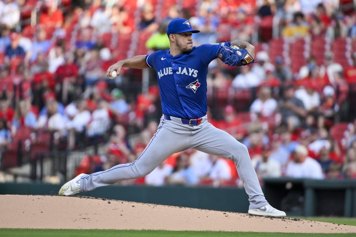 Jun 9, 2025; St. Louis, Missouri, USA;  Toronto Blue Jays starting pitcher Jose Berrios (17) pitches against the St. Louis Cardinals during the first inning at Busch Stadium. Mandatory Credit: Jeff Curry-Imagn Images