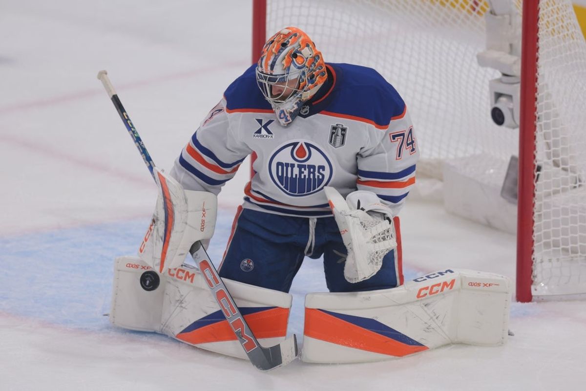 Jun 9, 2025; Sunrise, Florida, USA; Edmonton Oilers goaltender Stuart Skinner (74) blocks a shot on goal during the second period against the Florida Panthers in game three of the 2025 Stanley Cup Final at Amerant Bank Arena. Mandatory Credit: Sam Navarro-Imagn Images