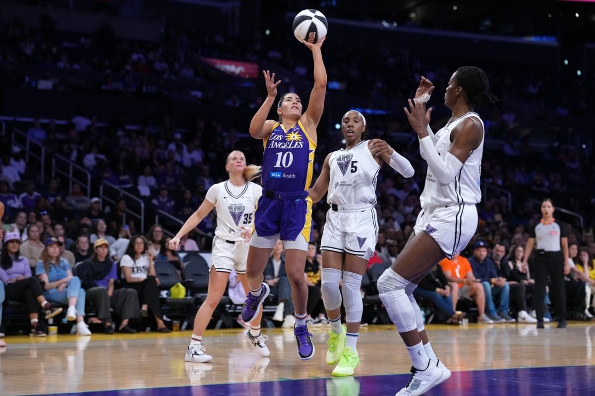 Jun 9, 2025; Los Angeles, California, USA; LA Sparks guard Kelsey Plum (10) shoots the ball against Golden State Valkyries guard Julie Vanloo (35), forward Kayla Thornton (5) and center Temi Fagbenle (14) in the first half at Crypto.com Arena. Mandatory Credit: Kirby Lee-Imagn Images