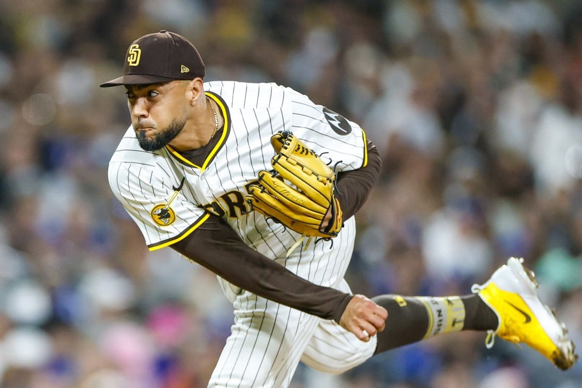 Jun 9, 2025; San Diego, California, USA; San Diego Padres relief pitcher Robert Suarez (75) throws a pitch during the ninth inning against the Los Angeles Dodgers at Petco Park. Mandatory Credit: David Frerker-Imagn Images
