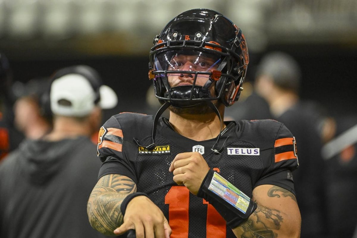 Jun 7, 2025; Vancouver, British Columbia, Canada;  BC Lions quarterback Jeremiah Masoli (11) warms up during the second half against the Edmonton Elks at BC Place Stadium. Mandatory Credit: Anne-Marie Sorvin-Imagn Images
