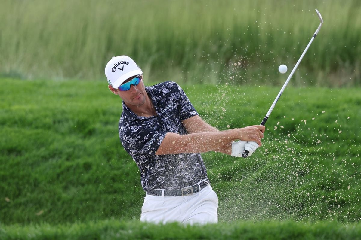 Jun 10, 2025; Oakmont, Pennsylvania, USA; Andrea Pavan plays a shot from a bunker on the eighth hole during a practice round for the U.S. Open golf tournament at Oakmont Country Club. Mandatory Credit: Bill Streicher-Imagn Images