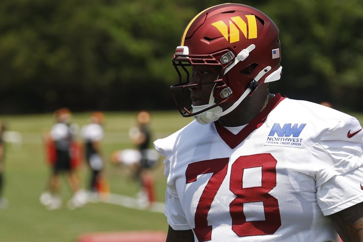 Jun 10, 2025; Ashburn, VA, USA; Washington Commanders offensive tackle Laremy Tunsil (78) stands on the field on day one of minicamp at Commanders Park. Mandatory Credit: Geoff Burke-Imagn Images