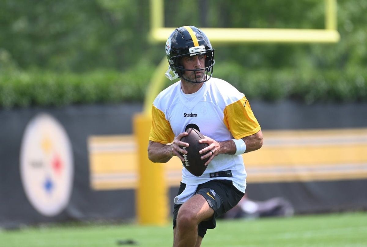 Jun 10, 2025; Pittsburgh, PA, USA;  Pittsburgh Steelers quarterback Aaron Rodgers (8) drops back to pass during minicamp at their South Side facility. Mandatory Credit: Philip G. Pavely-Imagn Images
