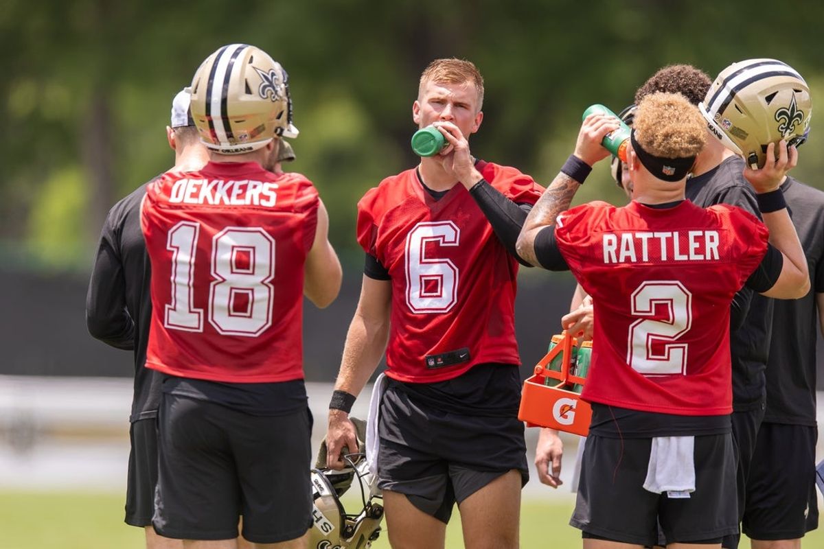 Jun 10, 2025; New Orleans, LA, USA;  New Orleans Saints quarterback Tyler Shough (6) and quarterback Spencer Rattler (2) and quarterback Hunter Dekkers (18) take a water break during minicamp at Ochsner Sports Performance Center. Mandatory Credit: Stephen Lew-Imagn Images