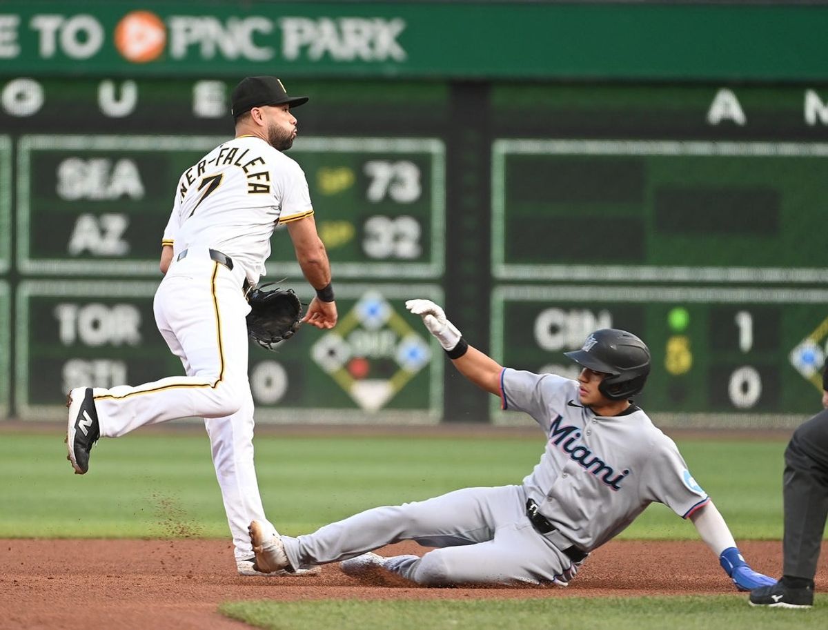 Jun 10, 2025; Pittsburgh, Pennsylvania, USA;  Pittsburgh Pirates shortstop Isiah Kiner-Falefa (7) forces out Miami Marlins runner Javier Sanoja (46) during the fifth inning at PNC Park. Mandatory Credit: Philip G. Pavely-Imagn Images