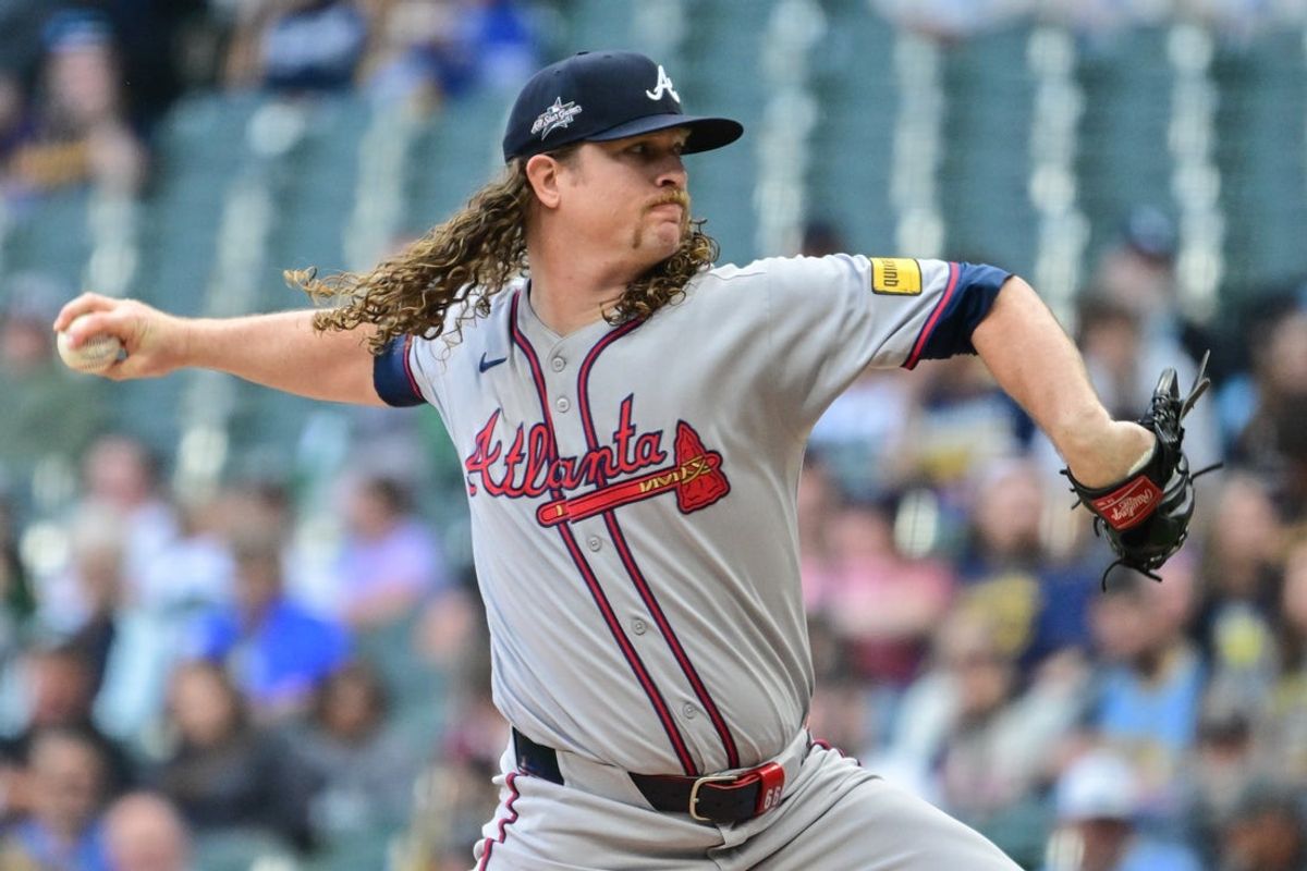 Jun 10, 2025; Milwaukee, Wisconsin, USA; Atlanta Braves starting pitcher Grant Holmes (66) throws a pitch in the first inning against the Milwaukee Brewers at American Family Field. Mandatory Credit: Benny Sieu-Imagn Images