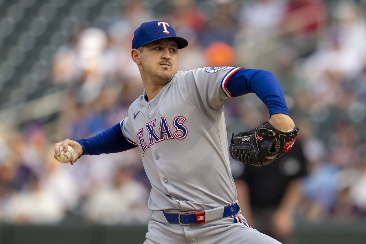 Jun 10, 2025; Minneapolis, Minnesota, USA; Texas Rangers starting pitcher Tyler Mahle (51) delivers a pitch against the Minnesota Twins in the first inning at Target Field. Mandatory Credit: Jesse Johnson-Imagn Images