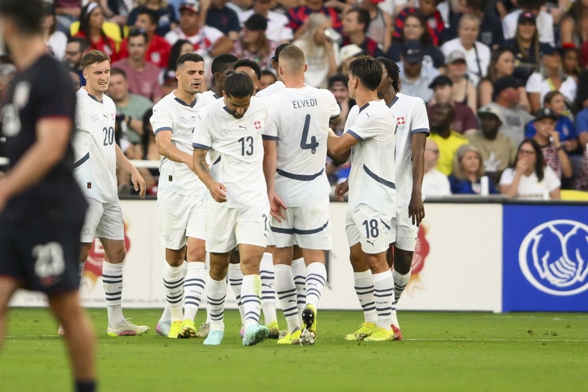 Jun 10, 2025; Nashville, Tennessee, USA;  Switzerland forward Breel Embolo (7) celebrates his goal with his teammates against the United States during the first at Geodis Park. Mandatory Credit: Steve Roberts-Imagn Images