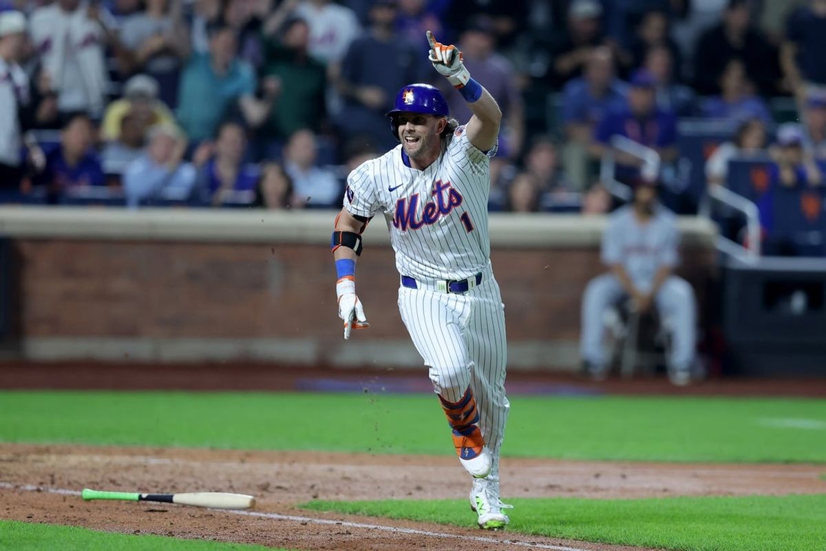 Jun 10, 2025; New York City, New York, USA; New York Mets second baseman Jeff McNeil (1) reacts to his tenth inning walkoff hit against the Washington Nationals at Citi Field. Mandatory Credit: Brad Penner-Imagn Images