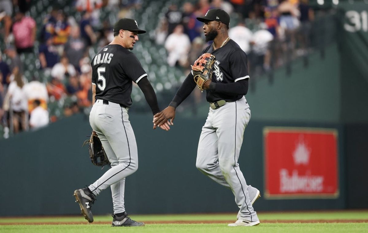 Jun 10, 2025; Houston, Texas, USA; Chicago White Sox second baseman Josh Rojas (5) celebrates with  center fielder Luis Robert Jr. (88) after defeating the Houston Astros at Daikin Park. Mandatory Credit: Thomas Shea-Imagn Images