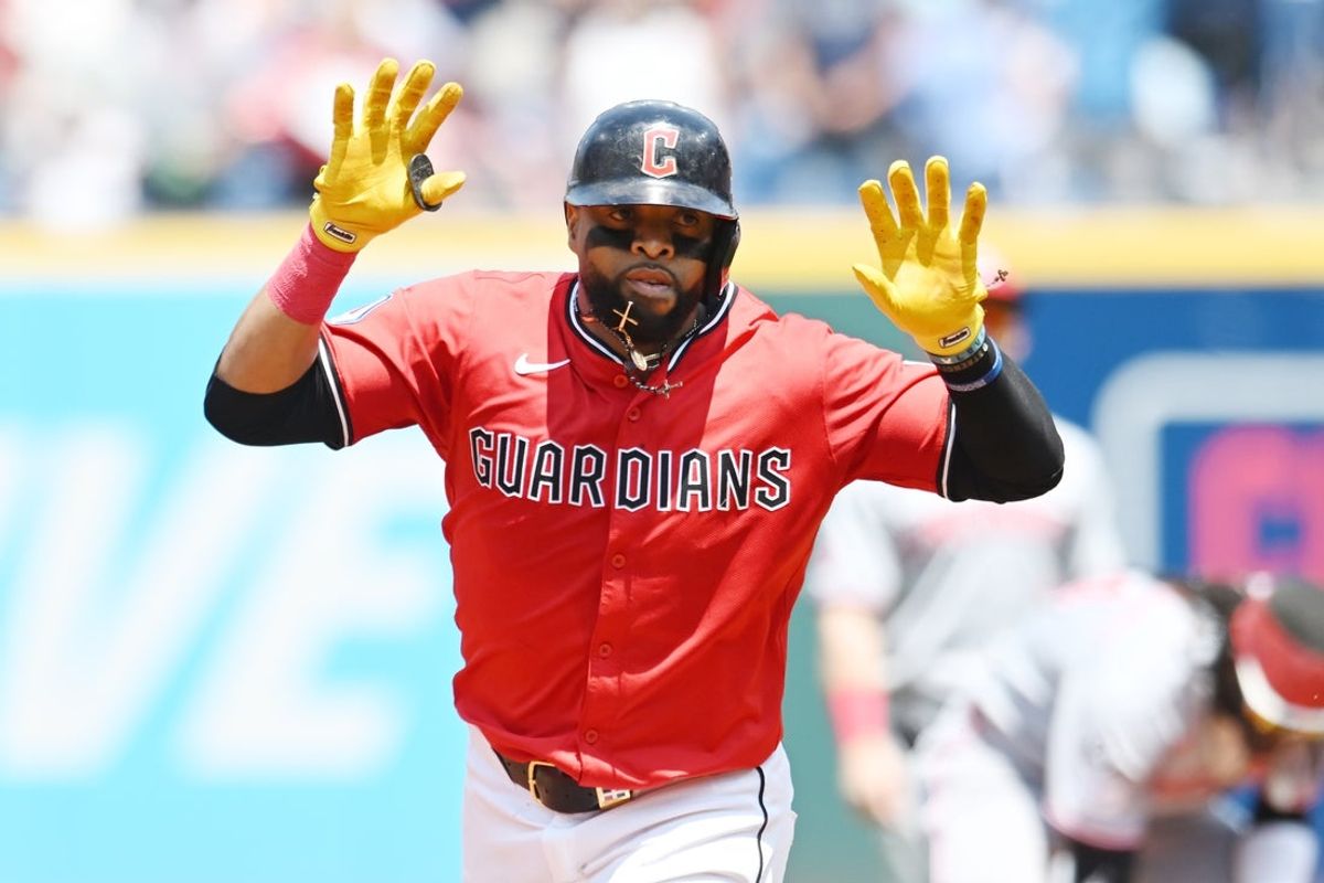 Jun 11, 2025; Cleveland, Ohio, USA; Cleveland Guardians first baseman Carlos Santana (41) rounds the bases after hitting a grand slam home run during the third inning against the Cincinnati Reds at Progressive Field. Mandatory Credit: Ken Blaze-Imagn Images