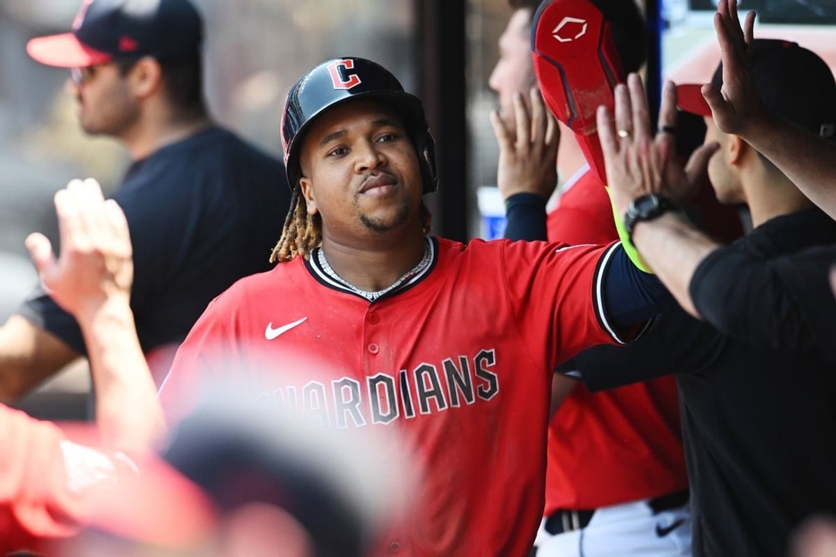Jun 11, 2025; Cleveland, Ohio, USA; Cleveland Guardians third baseman Jose Ramirez (11) celebrates after scoring on a grand slam by Cleveland Guardians first baseman Carlos Santana (not pictured) during the third inning against the Cincinnati Reds at Progressive Field. Mandatory Credit: Ken Blaze-Imagn Images