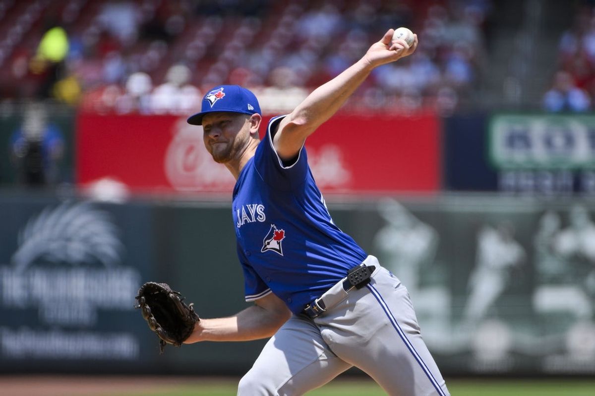 Jun 11, 2025; St. Louis, Missouri, USA;  Toronto Blue Jays starting pitcher Eric Lauer (56) pitches against the St. Louis Cardinals during the first inning at Busch Stadium. Mandatory Credit: Jeff Curry-Imagn Images