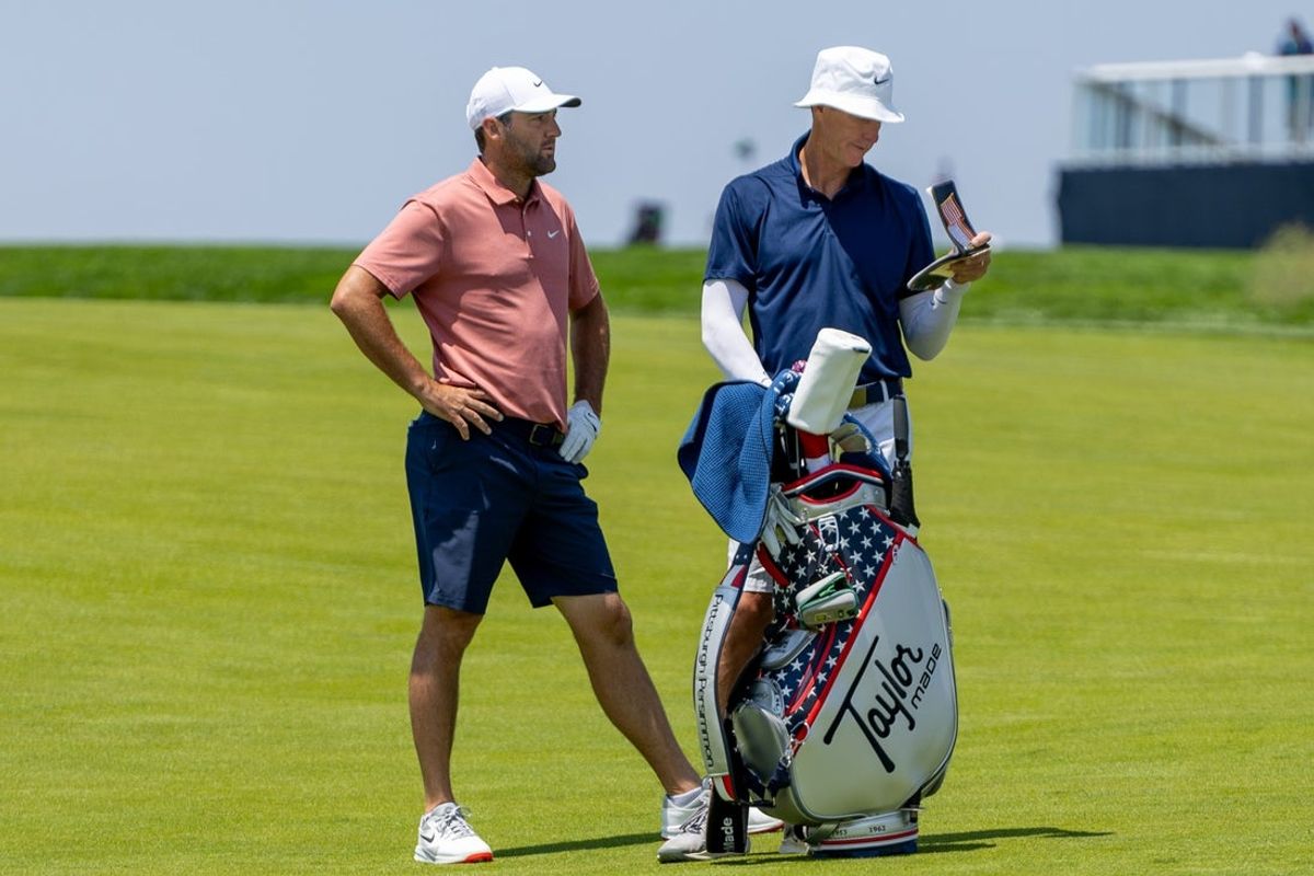 Scottie Scheffler looks on towards the No. 12 green while he awaits to take his second shot during the 125th U.S. Open practice round on June 11, 2025 at Oakmont Country Club in Oakmont, Pa.