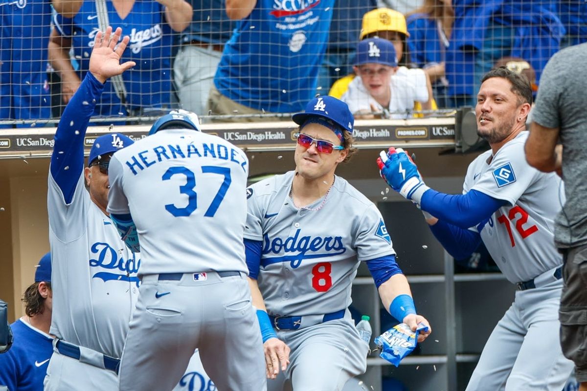 Jun 11, 2025; San Diego, California, USA; Los Angeles Dodgers right fielder Teoscar Hernandez (37) celebrates with the dugout after hitting a three run home run during the sixth inning against the San Diego Padres at Petco Park. Mandatory Credit: David Frerker-Imagn Images