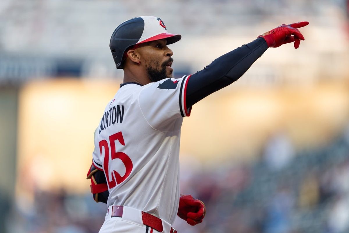 Jun 11, 2025; Minneapolis, Minnesota, USA; Minnesota Twins center fielder Byron Buxton (25) celebrates after hitting a three run home run during the third inning against the Texas Rangers at Target Field. Mandatory Credit: Jordan Johnson-Imagn Images