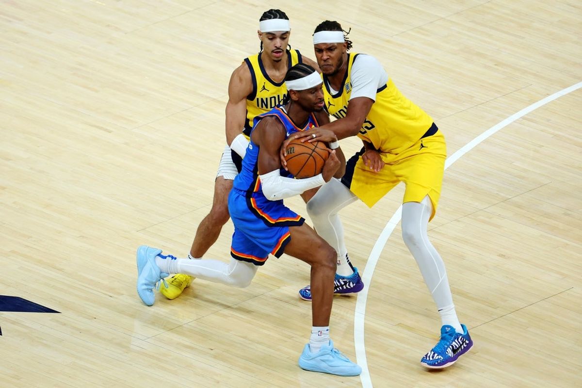 Jun 11, 2025; Indianapolis, Indiana, USA; Oklahoma City Thunder guard Shai Gilgeous-Alexander (2) drives to the basket against Indiana Pacers center Myles Turner (33) and guard Andrew Nembhard (2) during the third quarter in game three of the 2025 NBA Finals at Gainbridge Fieldhouse. Mandatory Credit: Trevor Ruszkowski-Imagn Images