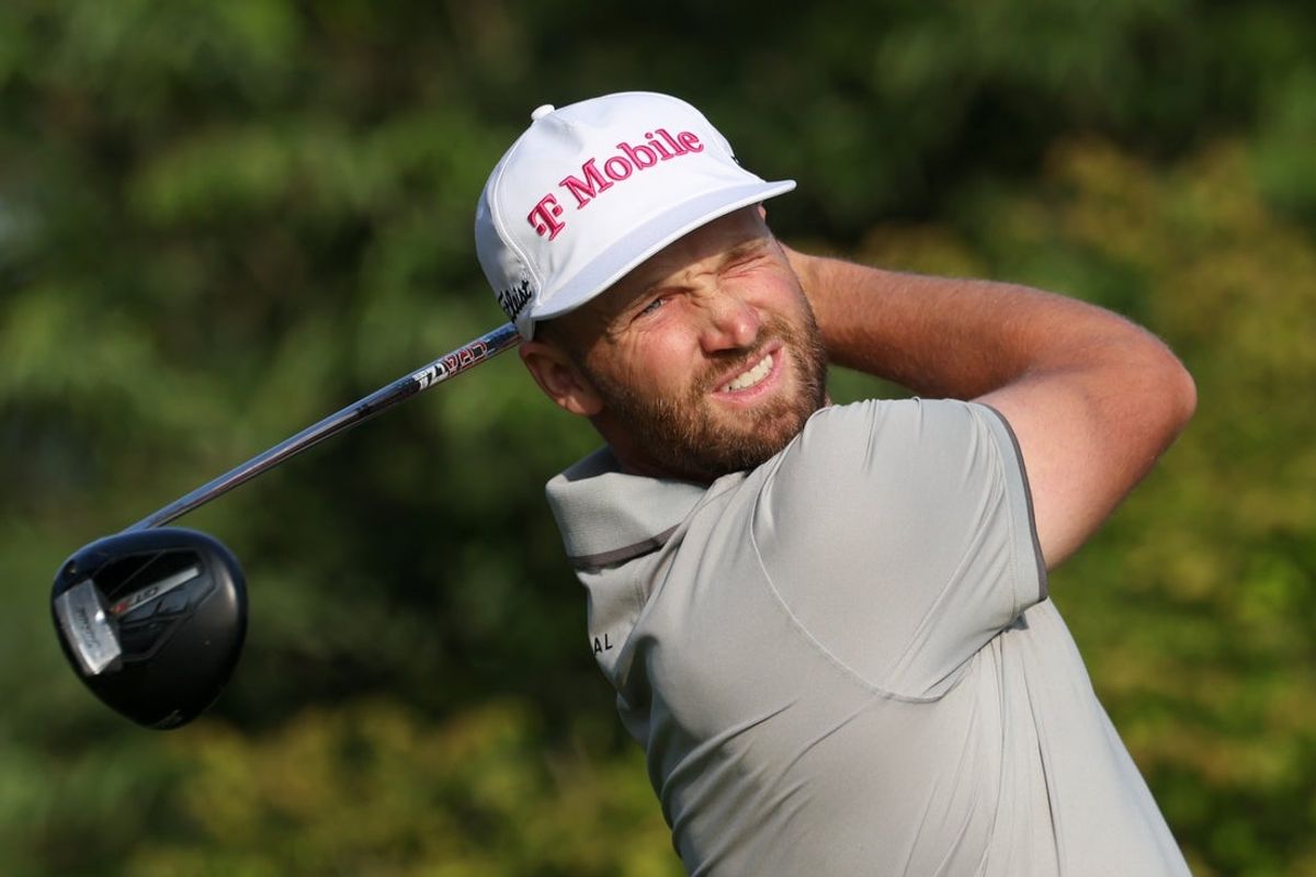 Jun 12, 2025; Oakmont, Pennsylvania, USA; Wyndham Clark plays his shot from the first tee during the first round of the U.S. Open golf tournament. Mandatory Credit: Charles LeClaire-Imagn Images