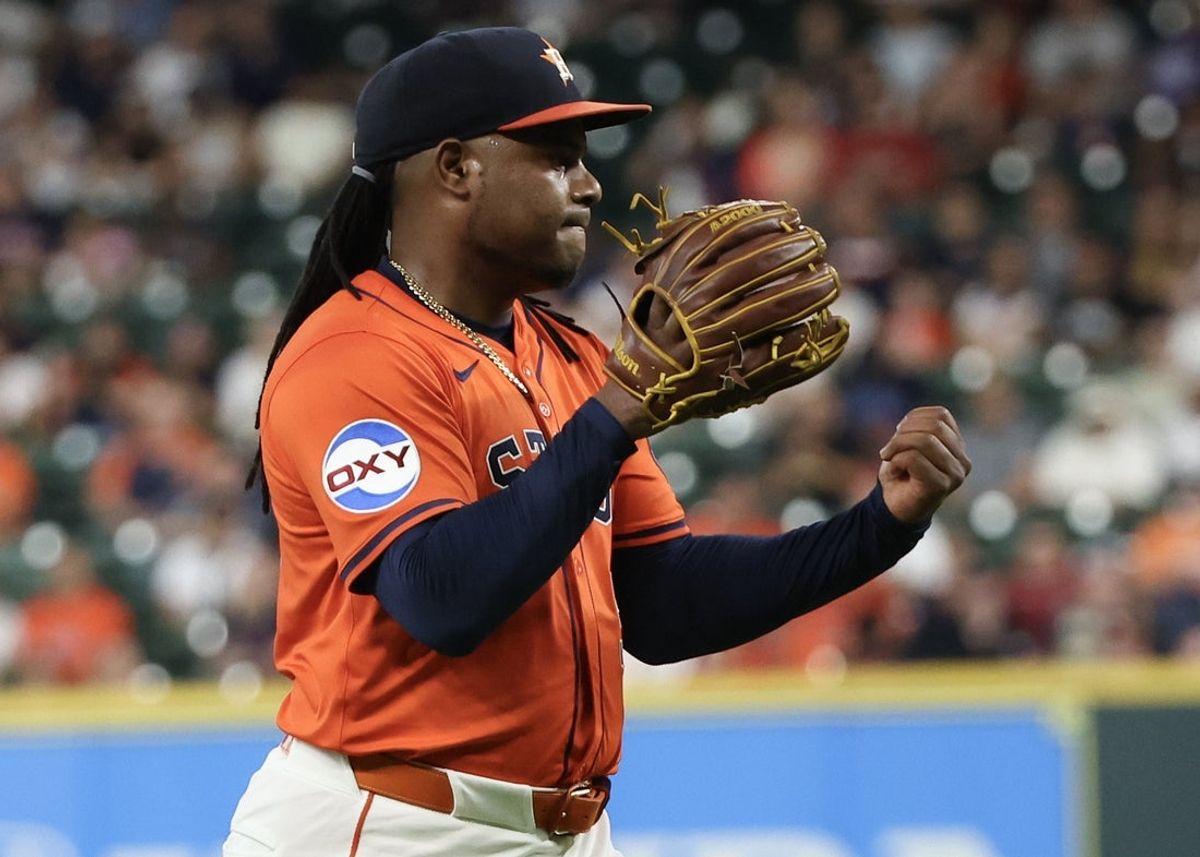 Jun 12, 2025; Houston, Texas, USA;  Houston Astros starting pitcher Framber Valdez (59) reacts after striking out the Chicago White Sox with the bases loaded to end the top of the first inning at Daikin Park. Mandatory Credit: Thomas Shea-Imagn Images
