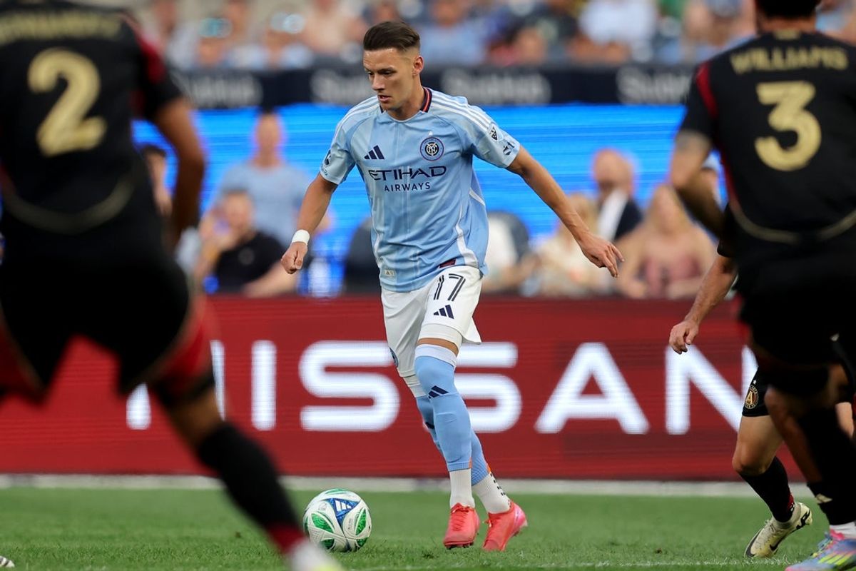 Jun 12, 2025; New York, New York, USA; New York City FC midfielder Hannes Wolf (17) controls the ball against Atlanta United defenders Ronald Hernandez (2) and Derrick Williams (3) during the first half at Yankee Stadium. Mandatory Credit: Brad Penner-Imagn Images