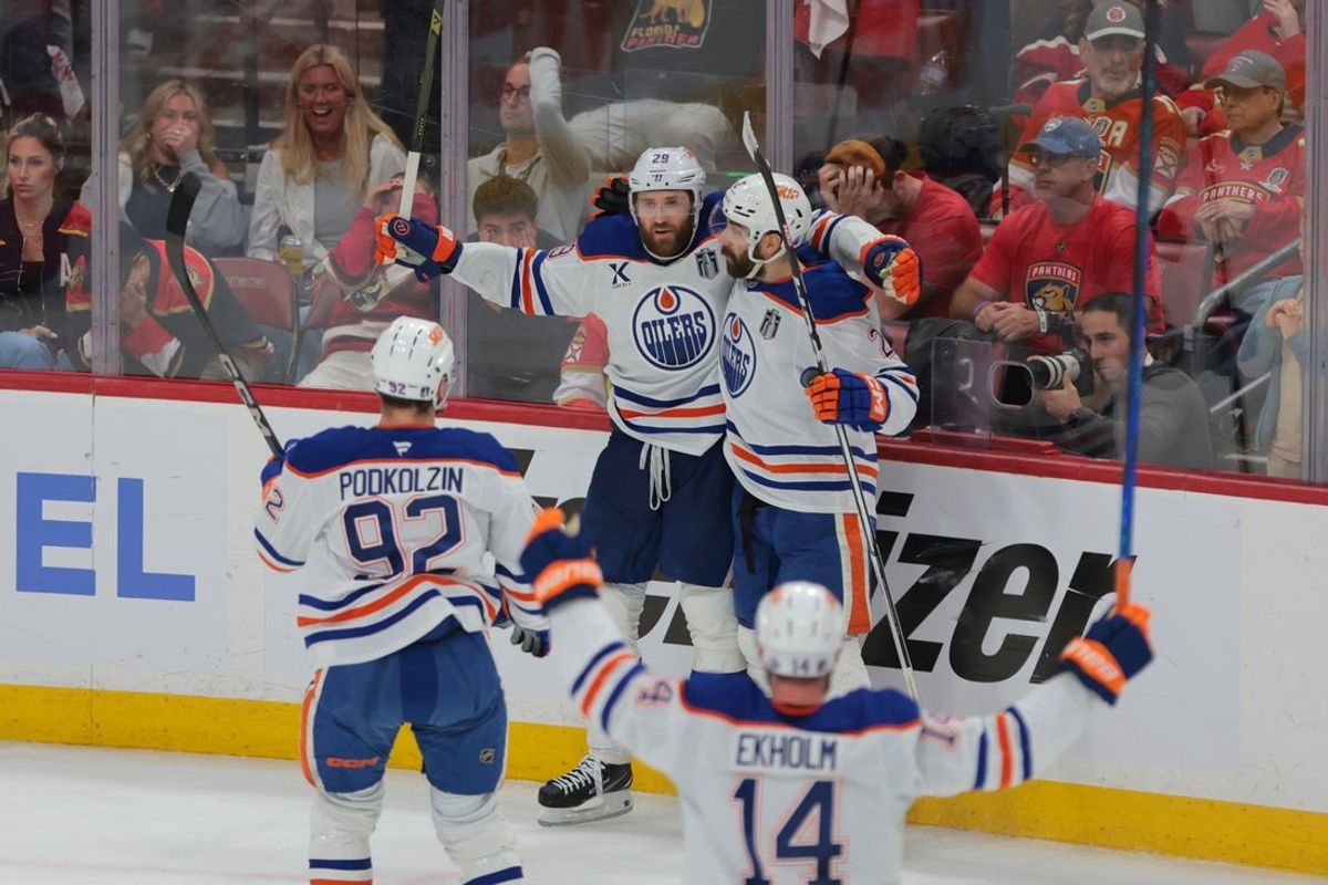 Jun 12, 2025; Sunrise, Florida, USA; Edmonton Oilers center Leon Draisaitl (29) celebrates scoring in overtime against the Florida Panthers in game four of the 2025 Stanley Cup Final at Amerant Bank Arena. Mandatory Credit: Sam Navarro-Imagn Images