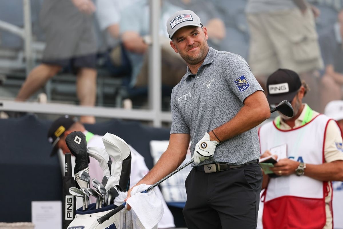 Jun 13, 2025; Oakmont, Pennsylvania, USA; Corey Conners prepares to tee off on the tenth hole during the second round of the U.S. Open golf tournament. Mandatory Credit: Bill Streicher-Imagn Images