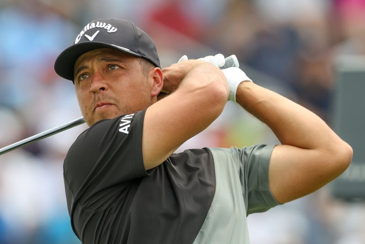 Jun 13, 2025; Oakmont, Pennsylvania, USA; Xander Schauffele plays his shot from the tenth tee during the second round of the U.S. Open golf tournament. Mandatory Credit: Charles LeClaire-Imagn Images