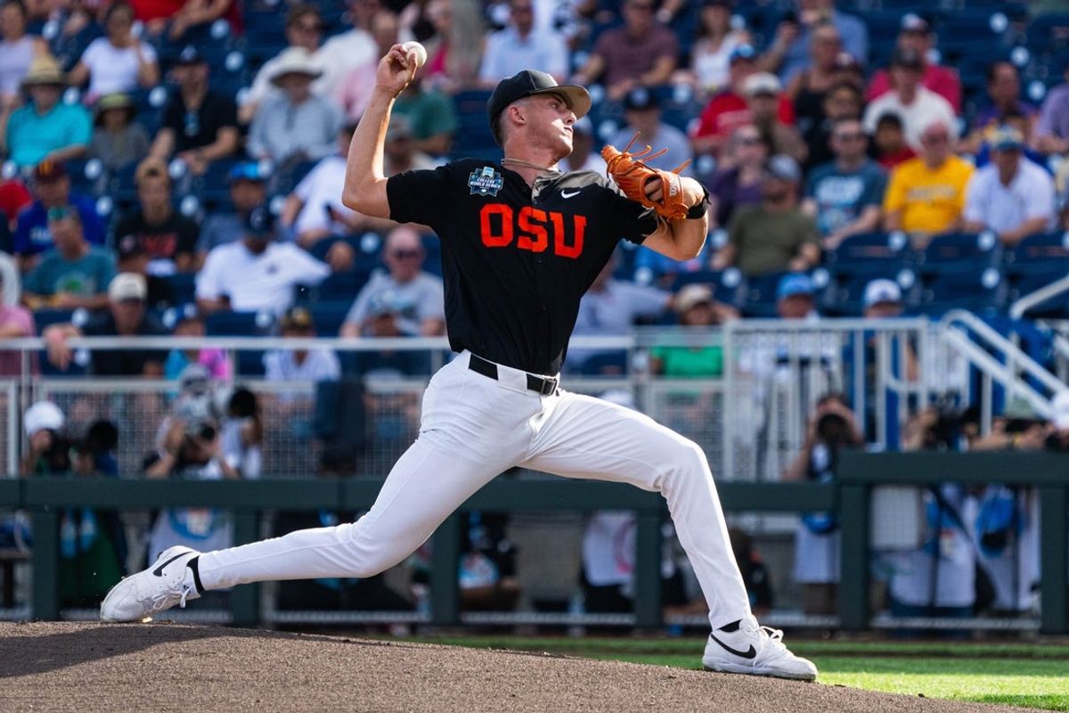 Jun 13, 2025; Omaha, Neb, USA; Oregon State Beavers starting pitcher Dax Whitney (30) pitches against the Louisville Cardinals during the first inning at Charles Schwab Field. Mandatory Credit: Dylan Widger-Imagn Images