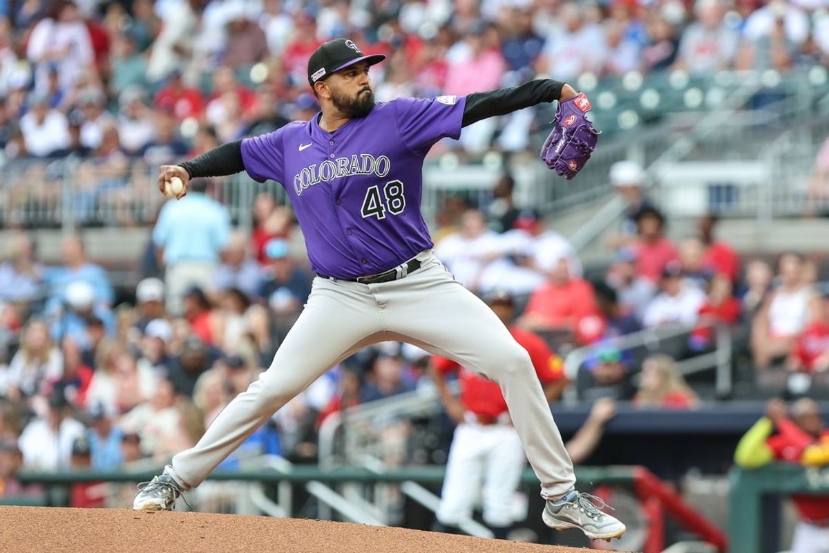Jun 13, 2025; Cumberland, Georgia, USA; Colorado Rockies pitcher German Marquez (48) pitches the ball against the Atlanta Braves during the first inning at Truist Park. Mandatory Credit: Jordan Godfree-Imagn Images