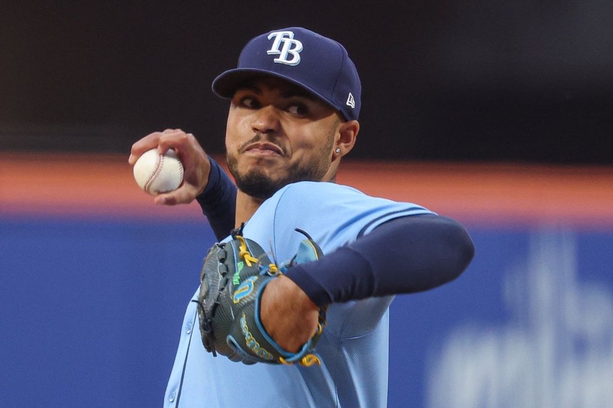 Jun 13, 2025; New York City, New York, USA; Tampa Bay Rays starting pitcher Taj Bradley (45) delivers a pitch during the third inning against the New York Mets at Citi Field. Mandatory Credit: Vincent Carchietta-Imagn Images