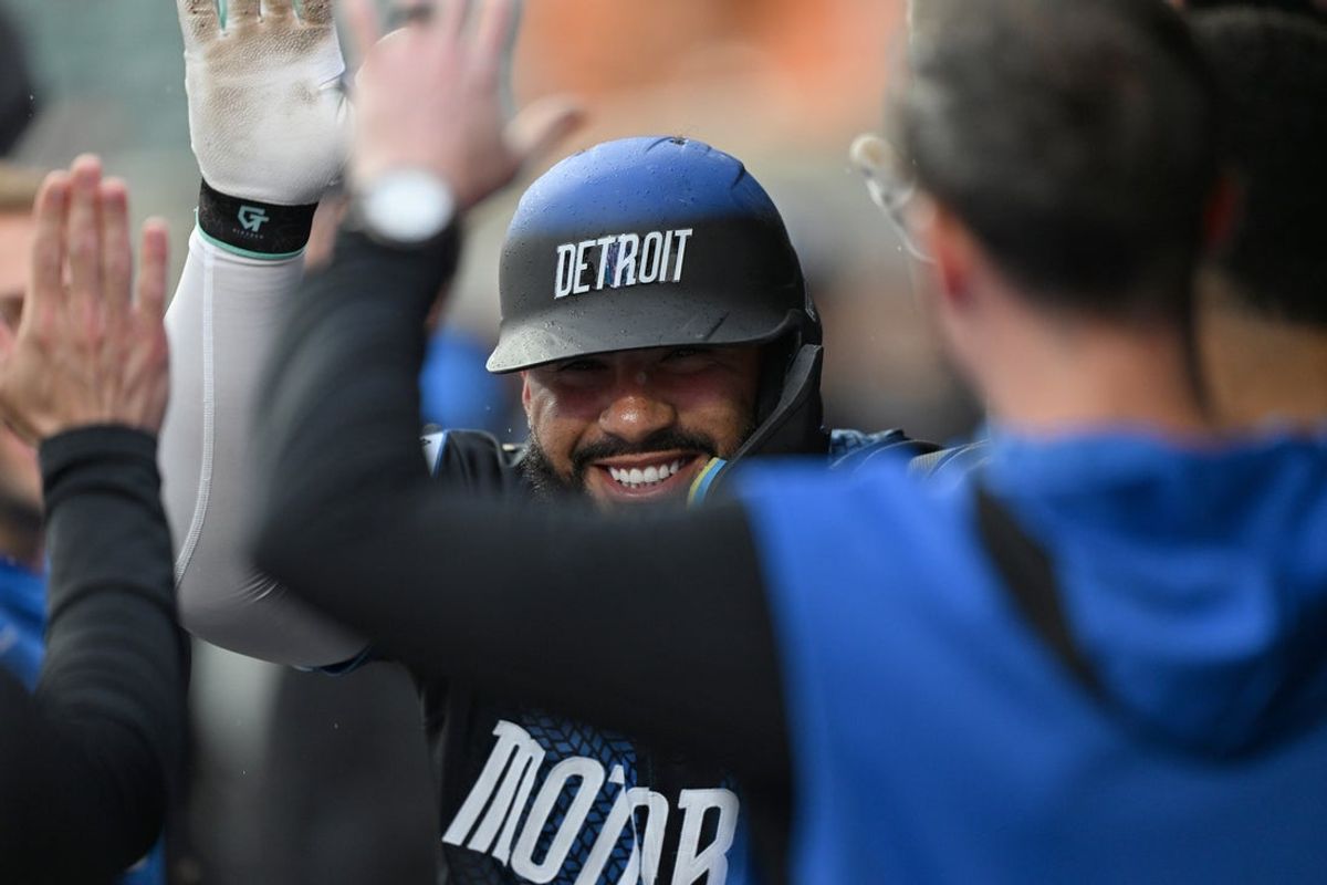 Jun 13, 2025; Detroit, Michigan, USA;  Detroit Tigers second base Gleyber Torres (25) celebrates in the dugout after hitting a lead off home run against the Cincinnati Reds in the first inning at Comerica Park. Mandatory Credit: Lon Horwedel-Imagn Images