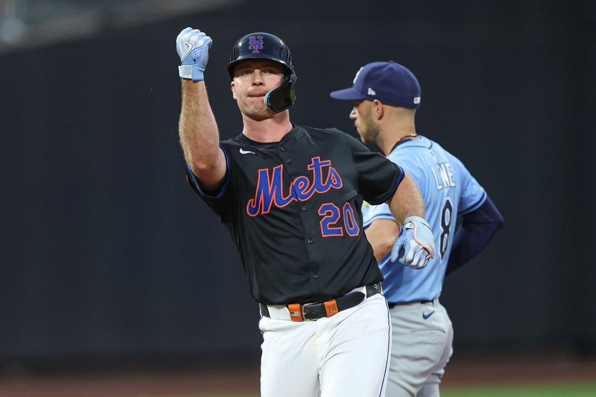 Jun 13, 2025; New York City, New York, USA; New York Mets first baseman Pete Alonso (20) reacts after a double during the fourth inning against the Tampa Bay Rays at Citi Field. Mandatory Credit: Vincent Carchietta-Imagn Images