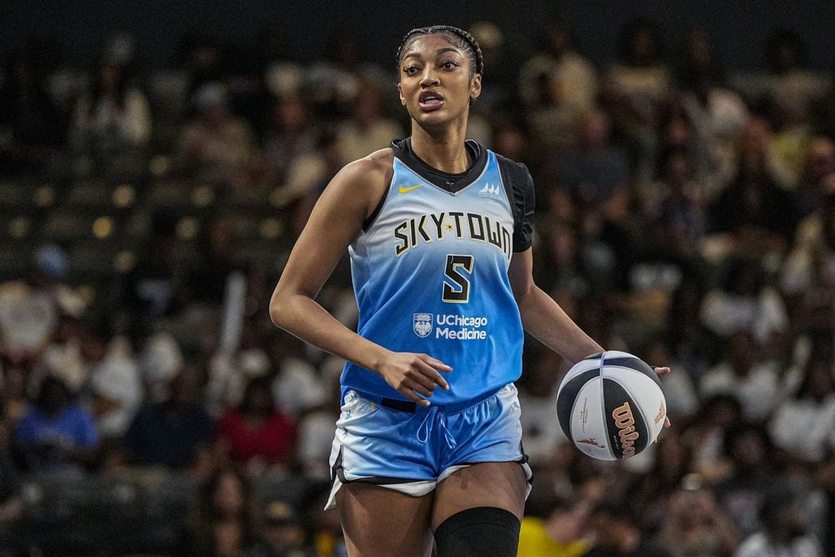 Jun 13, 2025; College Park, Georgia, USA; Chicago Sky forward Angel Reese (5) controls the ball against the Atlanta Dream during the first half at Gateway Center Arena at College Park. Mandatory Credit: Dale Zanine-Imagn Images
