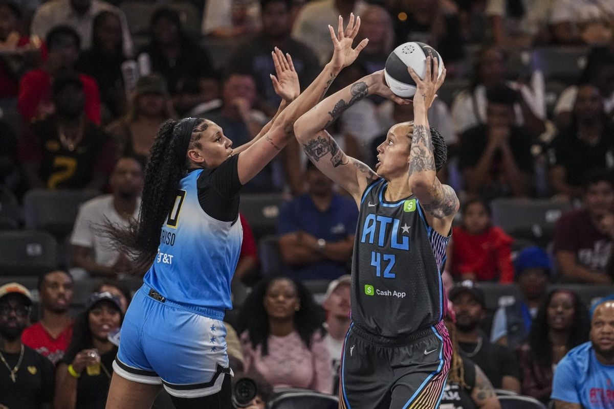 Jun 13, 2025; College Park, Georgia, USA; Atlanta Dream center Brittney Griner (42) shoots against Chicago Sky center Kamilla Cardoso (10) during the first half at Gateway Center Arena at College Park. Mandatory Credit: Dale Zanine-Imagn Images