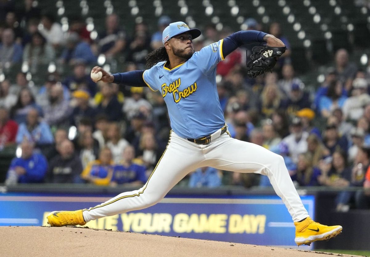 Jun 13, 2025; Milwaukee, Wisconsin, USA; Milwaukee Brewers pitcher Freddy Peralta (51) delivers a pitch against the St. Louis Cardinals in the first inning at American Family Field. Mandatory Credit: Michael McLoone-Imagn Images