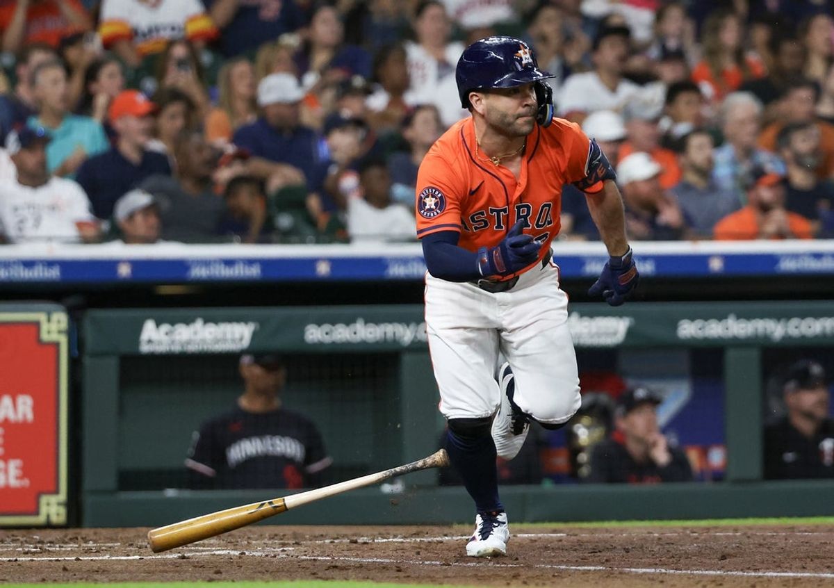 Jun 13, 2025; Houston, Texas, USA; Houston Astros designated Jose Altuve (27) hits a two run RBI double against the eMinnesota Twins  in the second inning at Daikin Park. Mandatory Credit: Thomas Shea-Imagn Images