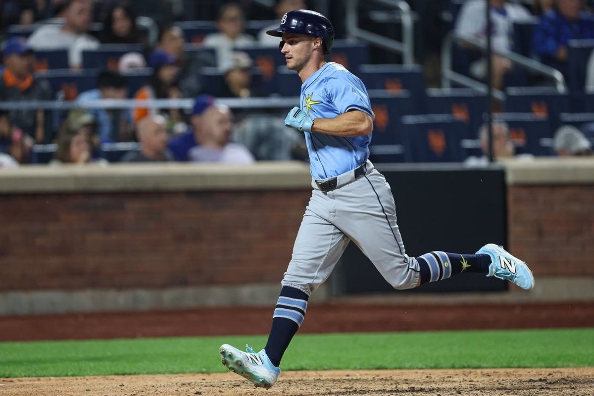 Jun 13, 2025; New York City, New York, USA; Tampa Bay Rays left fielder Jake Mangum (28) scores a run during the sixth inning against the New York Mets at Citi Field. Mandatory Credit: Vincent Carchietta-Imagn Images