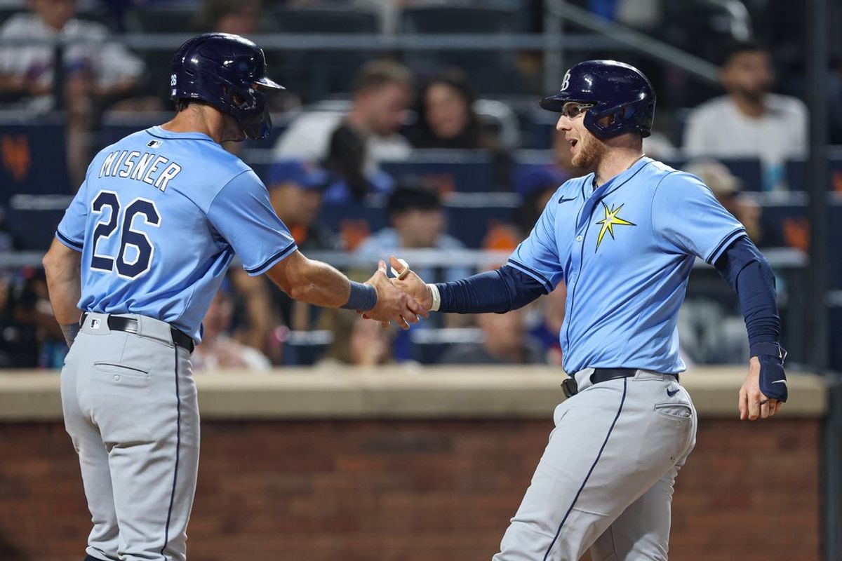 Jun 13, 2025; New York City, New York, USA; Tampa Bay Rays catcher Danny Jansen (19) celebrates with center fielder Kameron Misner (26) after hitting a two run home run during the sixth inning against the New York Mets at Citi Field. Mandatory Credit: Vincent Carchietta-Imagn Images